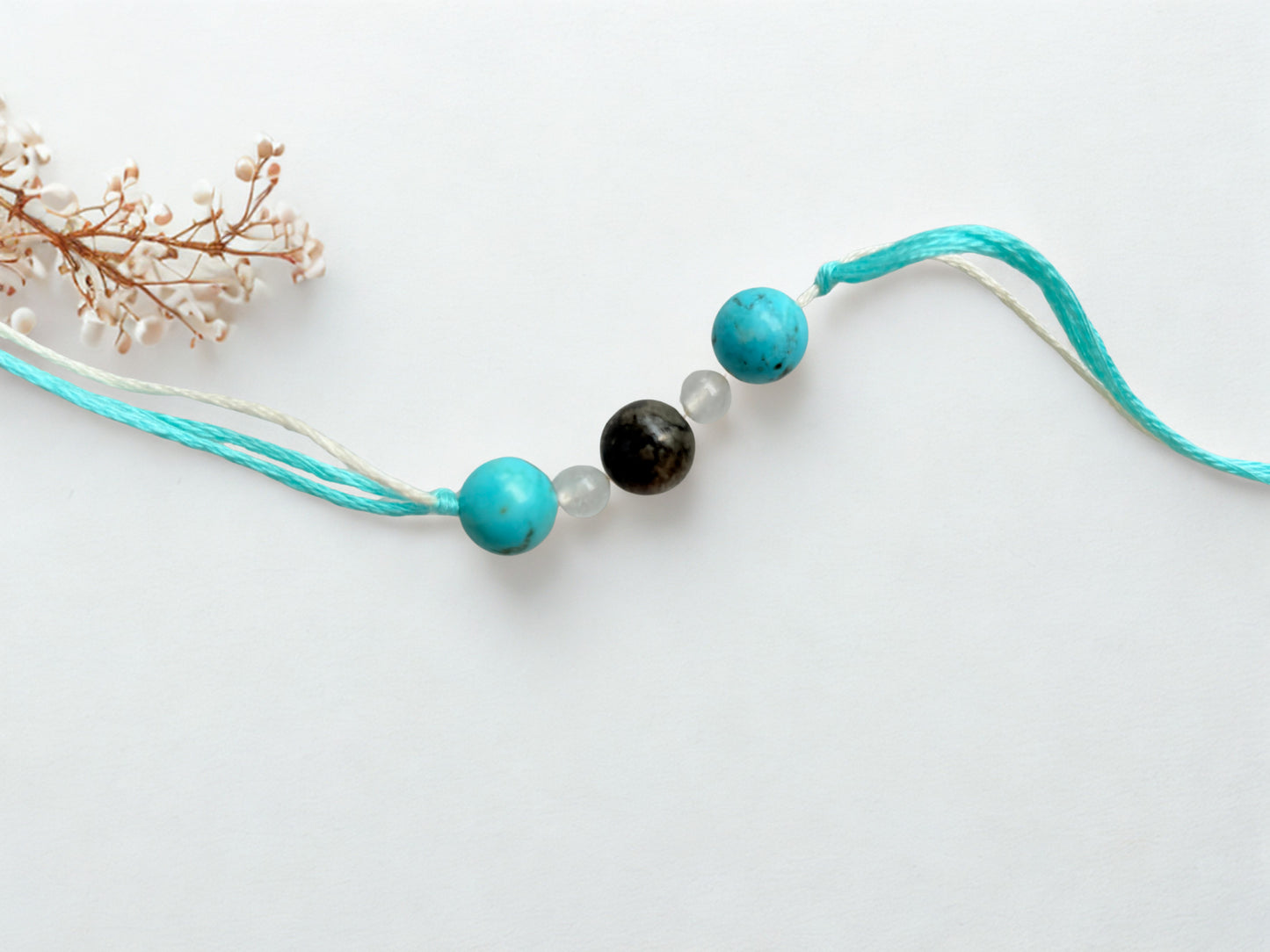 DIVYATRAYA GEMSTONE RAKHI