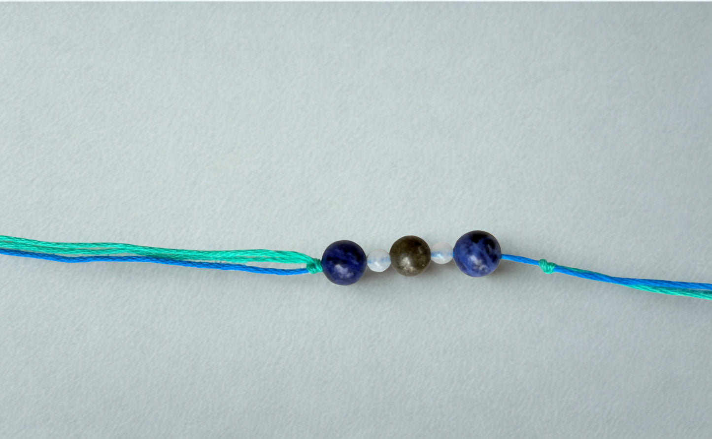DIVYASHRINGA GEMSTONE RAKHI