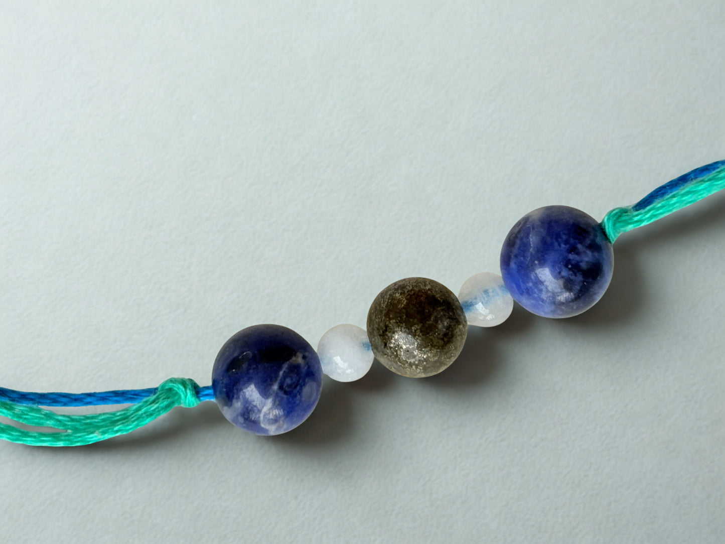 DIVYASHRINGA GEMSTONE RAKHI